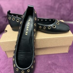 Coach Black Leather ballet flat.